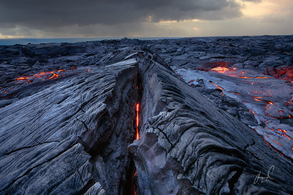 In this capture you can see straight into Pele’s veins and feel the hot life and new land flowing beneath me. What a scary thought, at any moment this could rush up in search of rich cool air! I took me nearly 30 minutes to take this photo…boy was I tempting Chance!