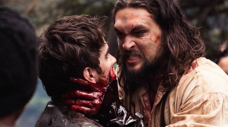 Michael Smyth (Landon Liboiron) and Declan Harp (Jason Momoa) in Frontier, the six-episode, one-hour drama from NETFLIX series currently shooting in Newfoundland, Canada. FRONTIER follows the chaotic and violent struggle to control wealth and power in the North American fur trade of the late 18th century, created by Rob Blackie and Peter Blackie, directed by Brad Peyton.​ ​Photo credit: Duncan de Young