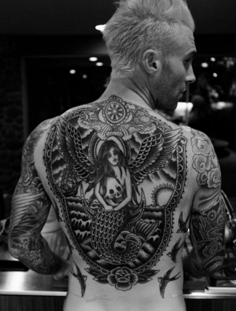 Extraordinario tatuaje foto 2